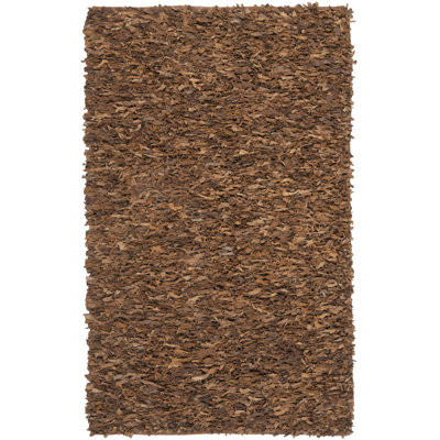 Tapis brun en cuir à poils longs tissé à la main