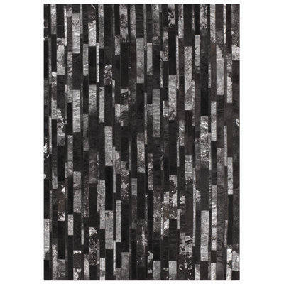 Tate Abstract Cowhide Area Rug