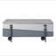 Table basse à finition ultrabrillante avec plateau relevable