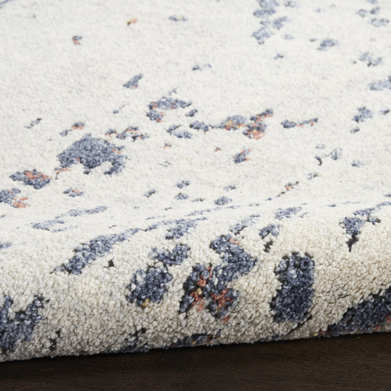 Tapis d'intérieur moderne bleu ivoire Wrought Studio ™ Motion 5 pi 3 po x 7 pi