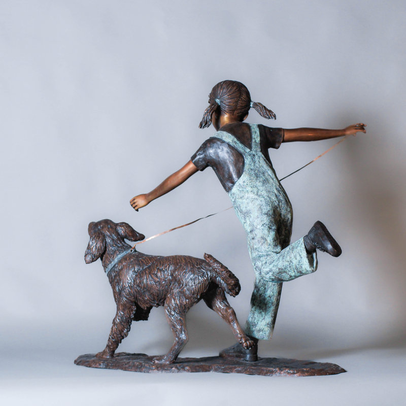 Statue bronze fille et chien qui court