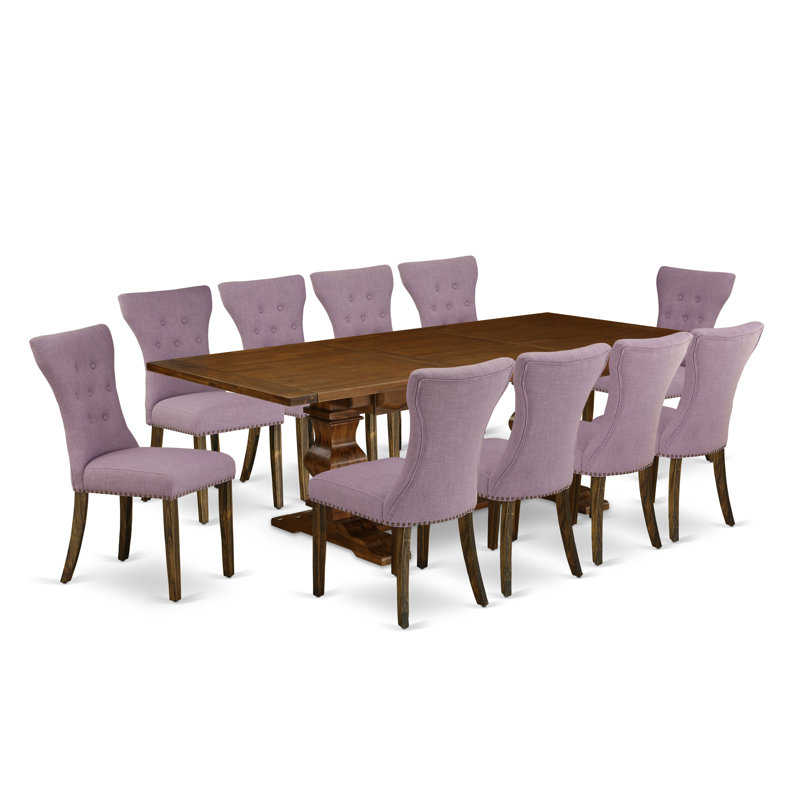 L'ensemble de table de salle à manger 11 pièces comprend une table de salle à manger rectangulaire avec rallonge amovible et 10 chaises rembourrées en tissu brun, jacobin vieilli