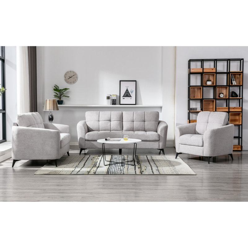 Salon en velours gris avec fauteuil confortable, coussin, siège à ressorts ensachés
