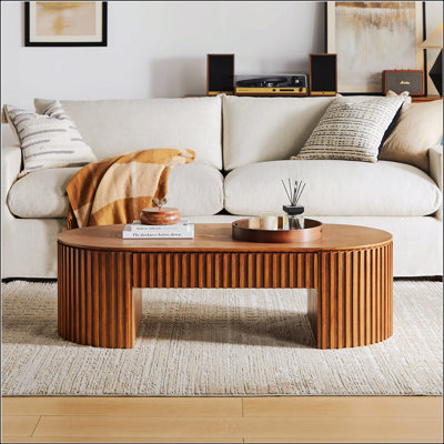 Table basse Mid-Century moderne en bois ovale avec tiroir spacieux, idéale pour un décor de salon élégant et fonctionnel.