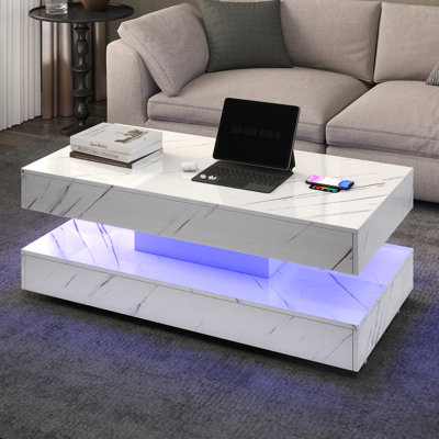 Table basse à DEL 47,2 po avec chargement sans fil et haut-parleurs Bluetooth, conception en marbre, table de salon moderne ultrabrillante avec 2 tiroirs