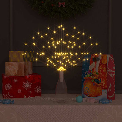 Décoration de Noël en forme de pétard et lumière des Fêtes