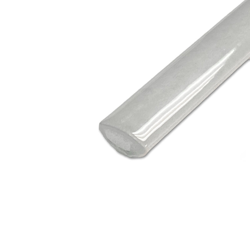 Coco Demi-Bullnose 1/2 In. X 7-7/8 In. Ceramic Wall Trim, Glossy Amber Gray