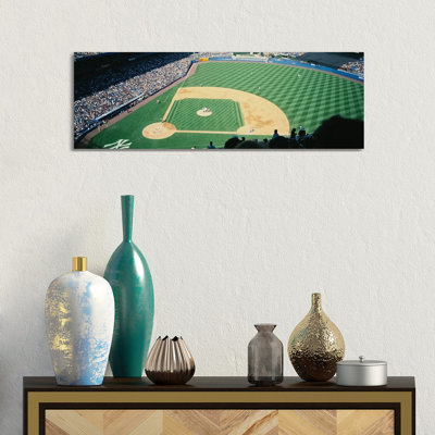 High Angle View Of Spectators Watching A Baseball Match In A Stadium, Yankee Stadium, New York City, New York State, USA by Panoramic Images - Wrapped Canvas Panoramic Gallery-Wrapped Canvas Giclée