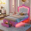 Structure de lit simple tapissier avec lumières DEL, lit princesse rembourré moderne avec tête de lit couronne, tiroir, rose et blanc