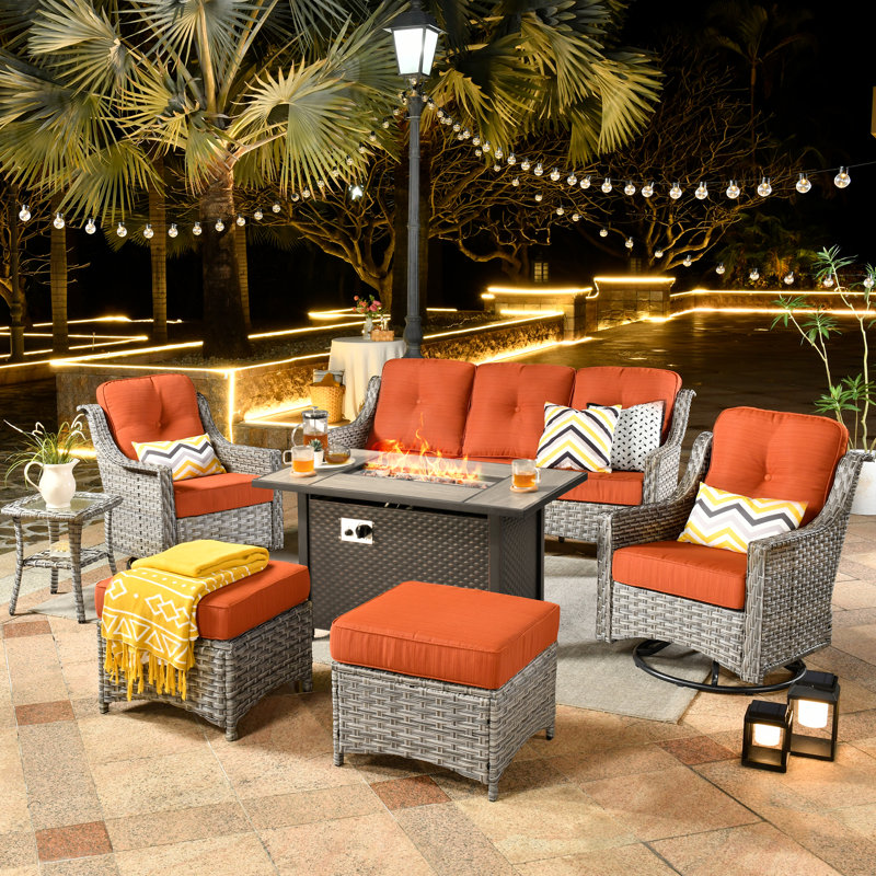 Emanuell 5 - Person All-Weather Wicker Outdoor Set with Swivel Chairs, Cushions Included, Tangerine Red