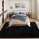 Tapis noir doux à poils longs