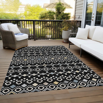 Tapis rectangulaire Aleighna avec envers antidérapant