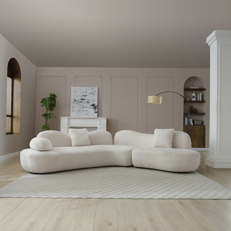 Le canapé modulaire incurvé moderne, le canapé Boucle 5 places pour le salon, la chambre à coucher, la couleur blanche, la forme en croissant et le dossier papillon complètent l'espace, 2 oreillers