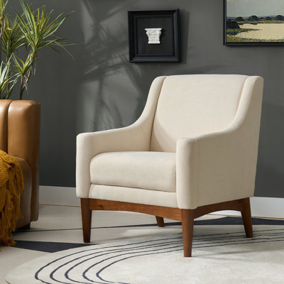 Fauteuil Arshanti avec pieds en bois massif