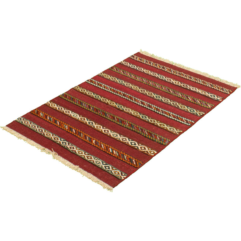 Tapis rouge foncé en laine noué à la main