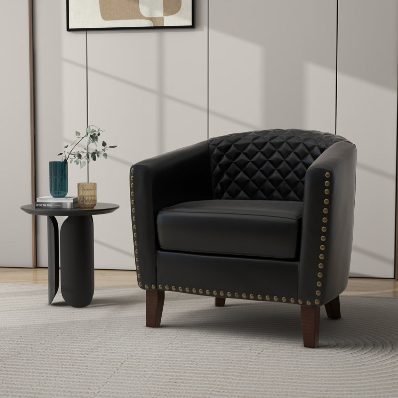 Fauteuil demi-tonneau capitonné en similicuir noir Edvardas, Similicuir noir