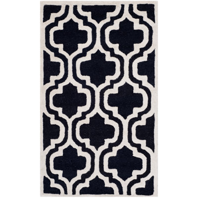 Tapis géométrique en laine noir