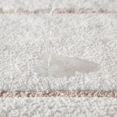 Roan Border Tufted Bath Rug
