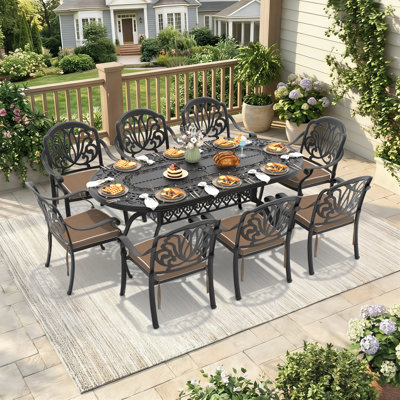 Ensemble de salle à manger de patio ovale avec 8 fauteuils, sièges rembourrés bruns, mobilier de jardin extérieur