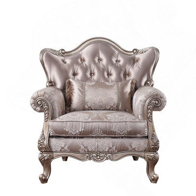 Chaise en tissu et champagne avec coussin
