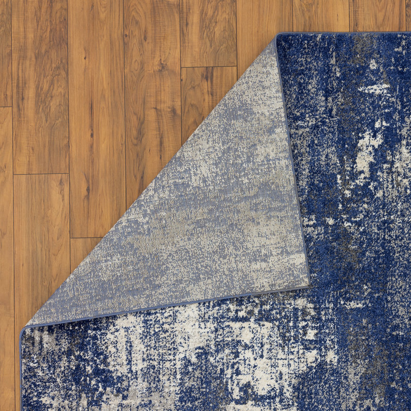 Blue and Beige Abstract 5' x 7' Synthetic Area Rug