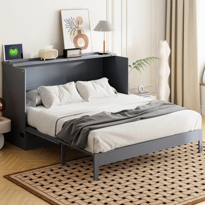Grand lit gris avec rangement intérieur spacieux et polyvalent