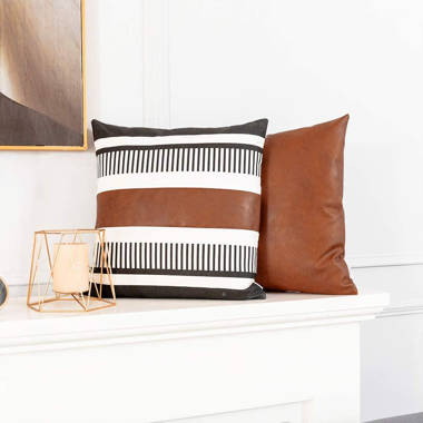 https://assets.wfcdn.com/im/08023431/resize-h380-w380%5Ecompr-r70/2359/235970406/Faux+Leather+Pillow+Cover.jpg