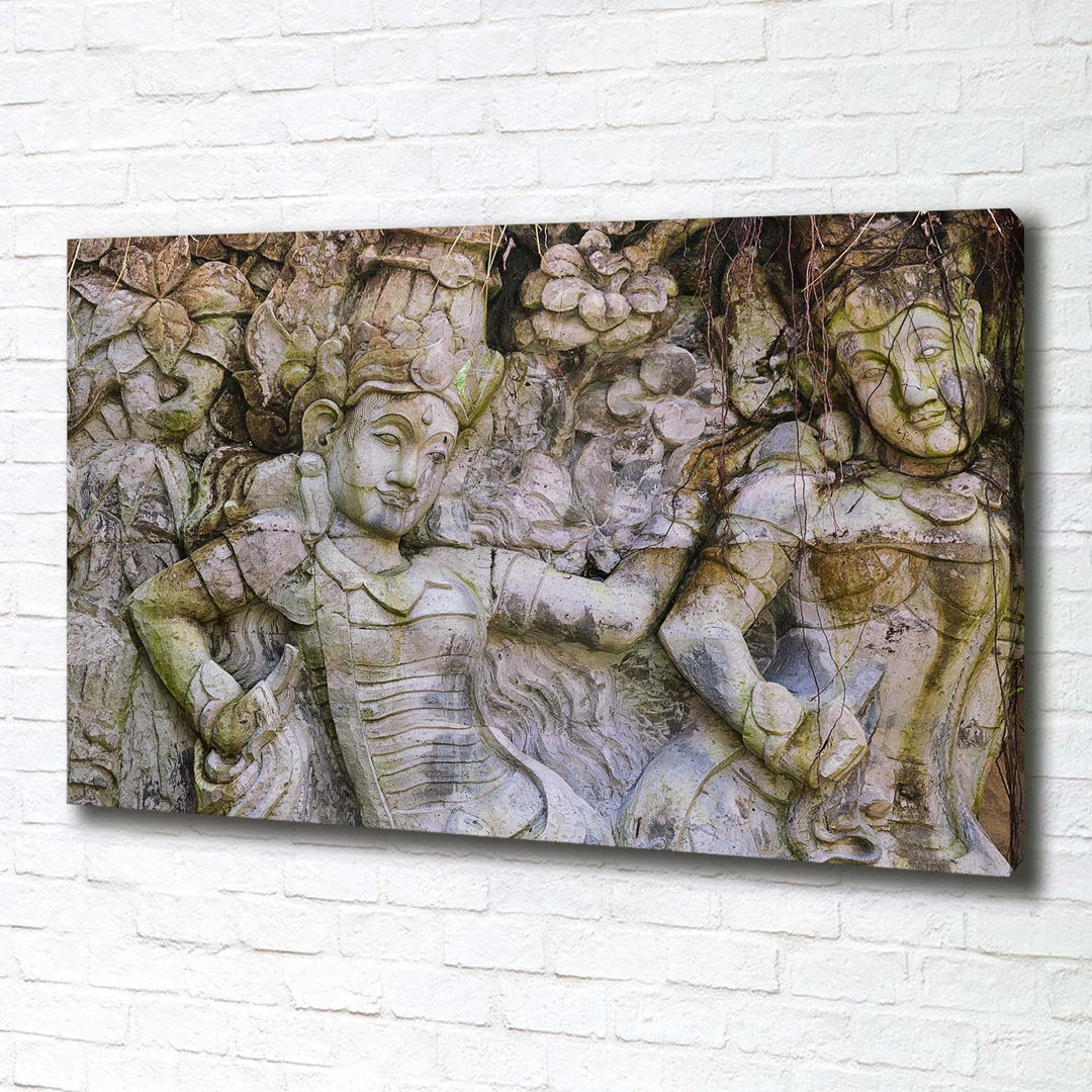 Eine Steinskulptur - Kunstdrucke auf Leinwand - Wrapped Canvas