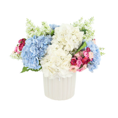 Centerpiece with Hydrangea, Lilacs and Ranunculus