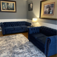 Bob's Discount Furniture Melanie Blue Nailhead Sofa and Ottoman