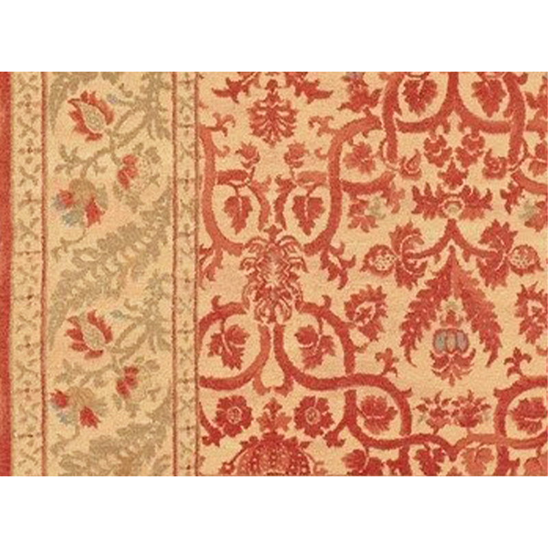 Tapis rouge et ivoire noué à la main de haute qualité