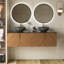 Meuble-lavabo mural en contreplaqué avec comptoir en pierre frittée noire et lavabo et portes ronds en céramique, couleur grain de bois chêne brun