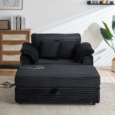Confortable fauteuil avec accoudoirs à ressorts et tabouret avec deux ports USB, idéal pour le salon et la chambre à coucher.