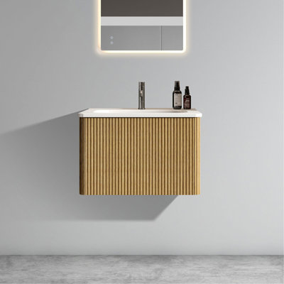 Meuble-lavabo élégant avec texture noyer rayé et lavabo intégré offrant une solution homogène et hygiénique.