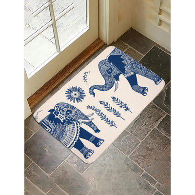 Tapis pour salle de bain à motif d'éléphants bleu et blanc 16 x 24 po