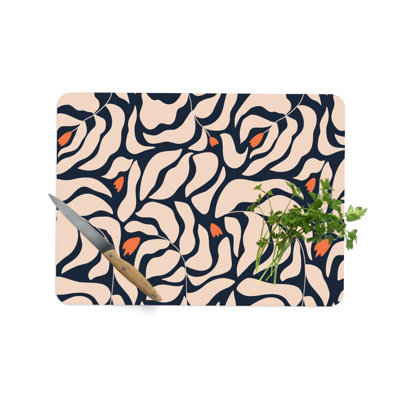 Planche à découper en verre moderne à motif abstrait avec un design minimaliste, idéale pour servir et hacher