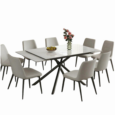Retractable Sintered Stone Dining Table Set,Featuring a modern rectangular design, it adopts black carbon steel table legs and a cross-leg structure at the bottom(Table + 8 Chairs)