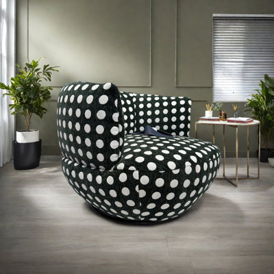 Fauteuil rotatif confortable à pois