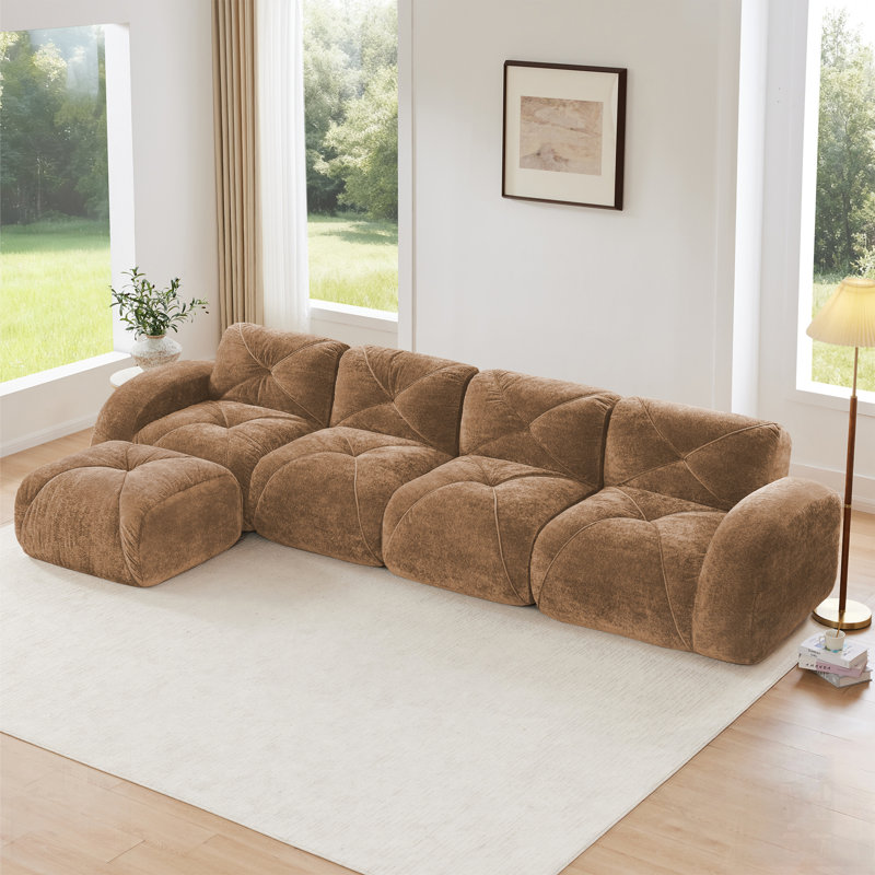 Canapé en L en velours doux avec capitonnage et repose-pieds mobile, aucun assemblage requis, idéal pour le confort et le style dans les salons.