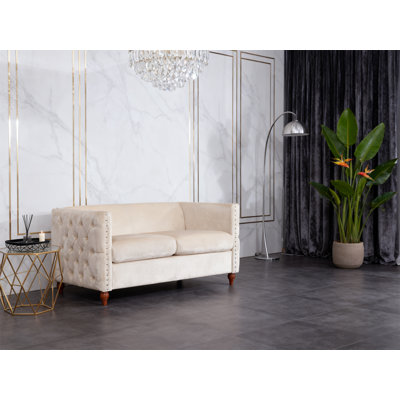 Causeuse rembourrée capitonnée beige pour 2 personnes