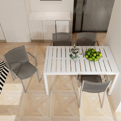4 Warm Grey Stackable Pp Armchairs And 55 Inch White Table - Structure, Non-Slip Foot Pads, Ideal For Different Environments 4Pcs Long , , Zero Maintenance Indoor/Outdoor Spaces