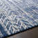 Addilee Geometric Dark Blue Area Rug