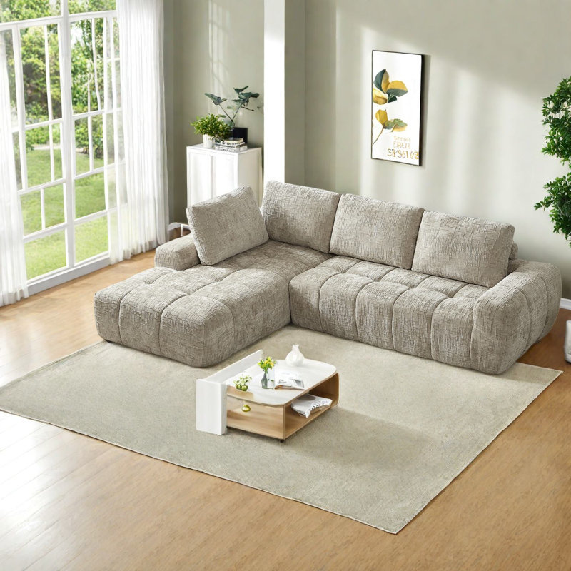 Canapé modulaire en L spacieux et modulaire en chenille avec un design moderne, parfait pour le salon et les appartements