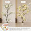 Magnolia artificiel avec des fleurs blanches réalistes et des feuilles vertes luxuriantes