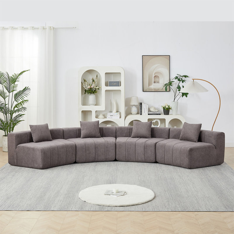 Curved Sectional Sofa With 4 Pillows