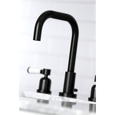 Kingston Brass Two-Handle 3-Hole Deck Mount Widespread Bathroom Faucet with Brass Pop-Up Drain