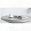 Table basse avec base piédestal en gris patiné