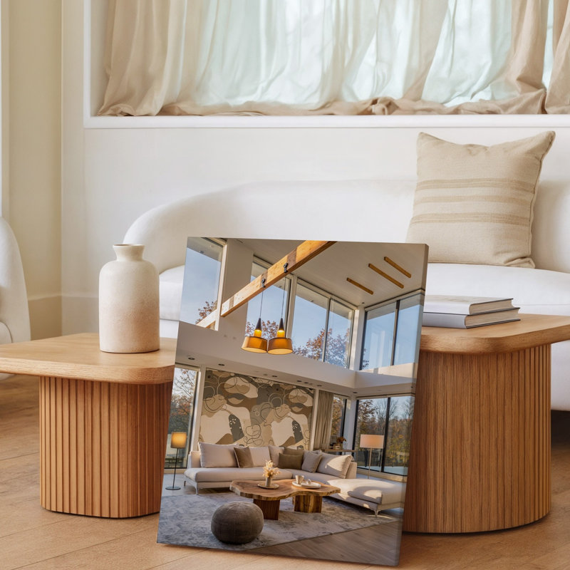 Toile d'un salon moderne spacieux avec un grand canapé modulaire de couleur murale orné de coussins moelleux posés sur une toile