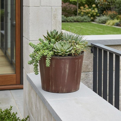 7" Brown and Ivory Abstract Recycled Plastic Indoor Outdoor Round Pot Planter