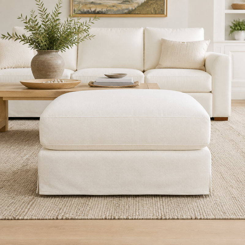 Pouf carré capitonné avec base à jupe